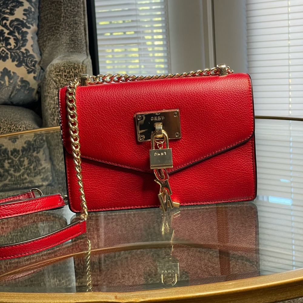 Brand new red/gold DKNY purse. %100 Authentic